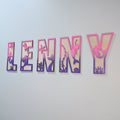Personalised wooden mermaid and ocean themed name sign with pink and purple layered details